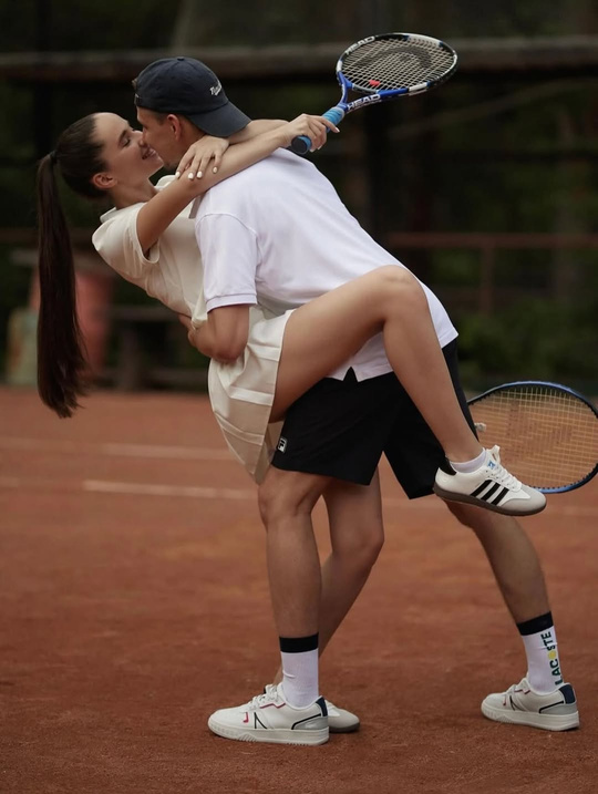 Couple on clay court — Madaia community
